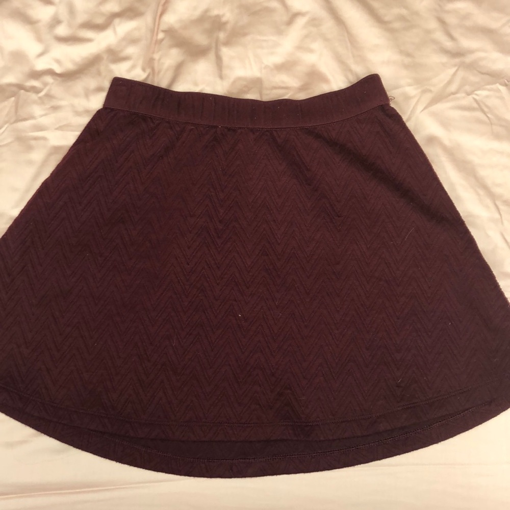 A maroon mini shirt.